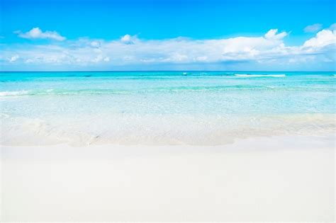 Premium Photo White Sand Beach And Turquoise Waves Turquoise Sea Water And Blue Sky Eagle