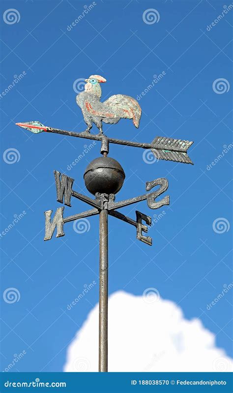 Wind Vane For Indicating The Wind Direction With The Blue Sky Ba Stock