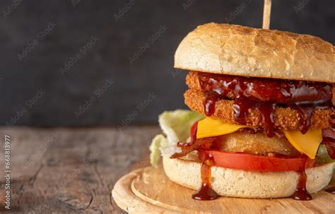 Smoked Chickenburger Cropped Wooden Plate On Dark Backgrounds With