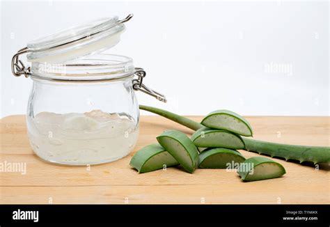 Aloe Vera Gel In Glass Container With Slices By The Side Stock Photo