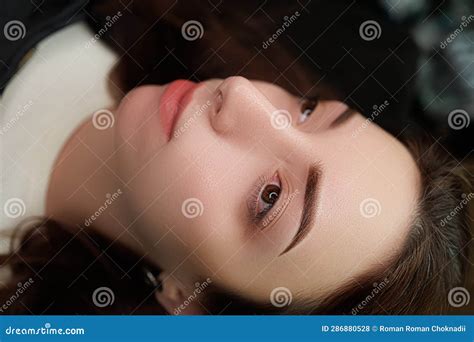 The Girl Has A Beautiful Permanent Makeup With Shading On Her Eyebrows
