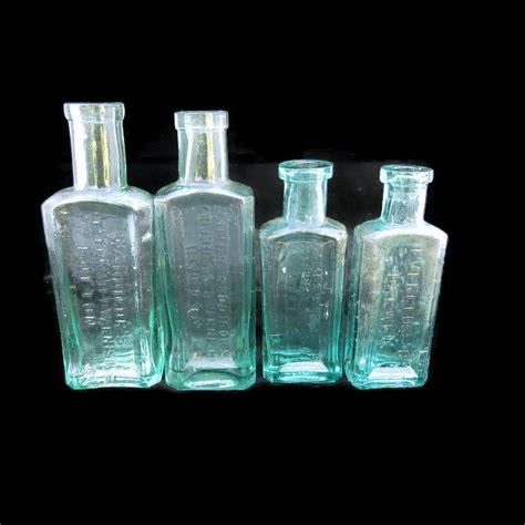 Vintage Edwardian Aqua Blue Glass Bottle Set Of 4 James Waddicors Celebrated Varnish Bolton