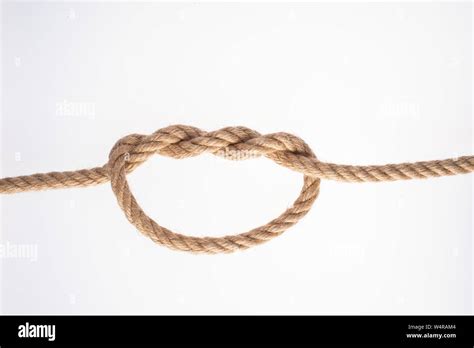 Double Overhand Knot. Rope node Stock Photo - Alamy