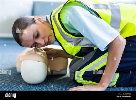 Female Paramedic During Cardiopulmonary Resuscitation Training Stock