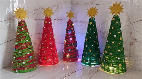 Árbol de navidad con estambre Manualidades Artesanías navideñas