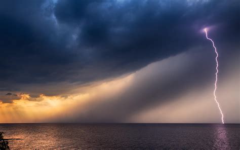 Lightning, black clouds, storm at sea