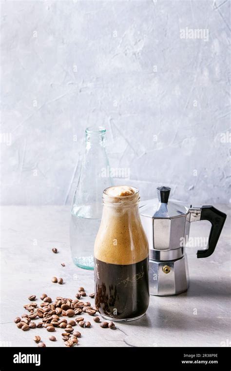 Bottle Of Fizzy Iced Coffee Espresso With Bottle Of Sparkling Water