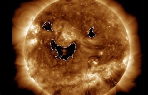 Photo from NASA satellite shows the sun was 'smiling' this week