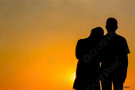 Lovers Holding Hands Sunset