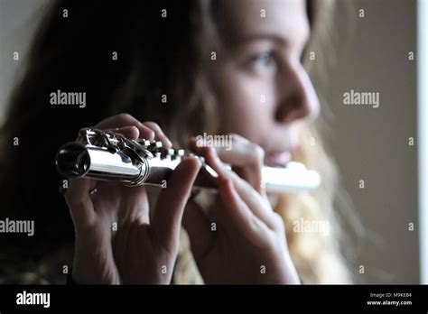 Young Woman Playing Flute Hi Res Stock Photography And Images Alamy