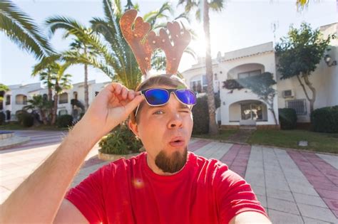 Premium Photo Portrait Of Man Wearing Sunglasses Against Trees