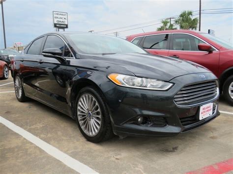 Pre Owned 2014 Ford Fusion Titanium 4d Sedan In Bay City 9941a Reliance Chevrolet Gmc