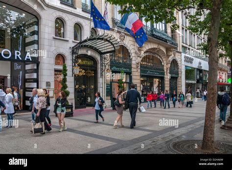 Outdoor cafes and shops along Avenue des Champs-Elysees in Paris,France Stock Photo - Alamy