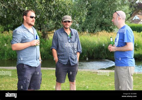 Men Standing And Drinking Beer Outside Stock Photo Alamy