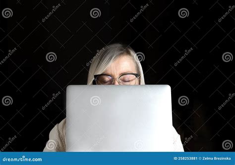 Tired Mature Woman S Face With Closed Eyes And Glasses Hidden Behind A