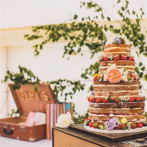 Beautiful Four Tier Naked Wedding Cake Decorated With Summer Fruits