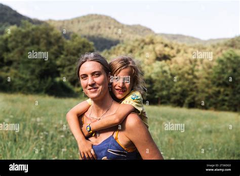 Mother Giving Her Son Piggyback Hi Res Stock Photography And Images Alamy