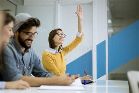 Students in a Classroom - Rising Hand Stock Image - Image of smiling ...