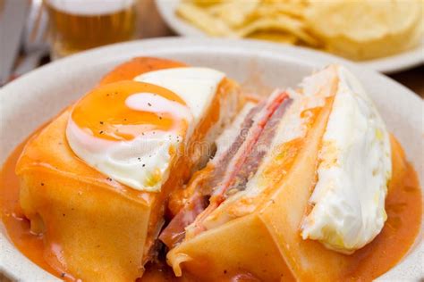 Traditional Portuguese Sandwich with Sauce Francesinha on Dish Stock Photo - Image of sandwich ...