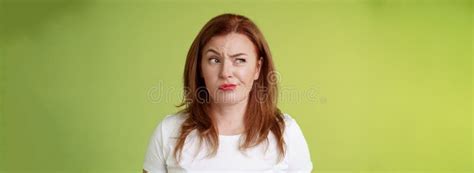 Perplexed Doubtful Unsure Redhead Wife Smirking Unsatisfied Frowning