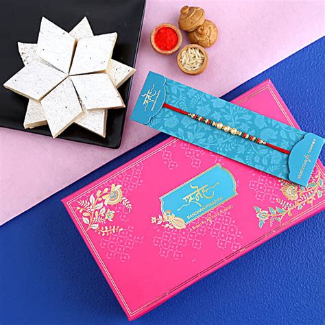 Traditional Pearl Studded Mauli Rakhi And Kaju Katli Singapore Gift