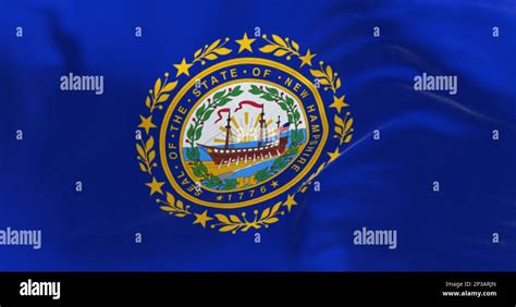 Detail of New Hampshire state flag waving. New Hampshire state seal on ...