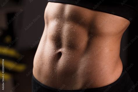 Beautiful Super Fit Young Woman Showing Off Her Perfect Muscular Ripped