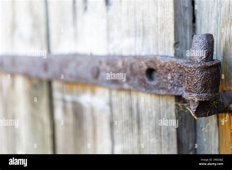 Old Iron Hinges On A Wooden Door Stock Photo Alamy
