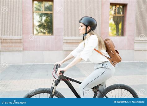 Profile Of A Businesswoman Riding A Bike To Work Stock Image Image Of