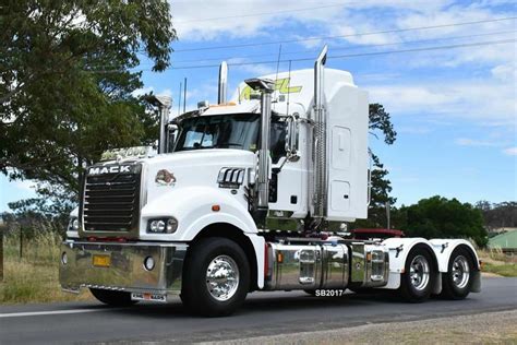 Custom White Mack Truck Driving