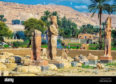 Colossal Statues Of The Pharoah Stand In The Northern Half Of The
