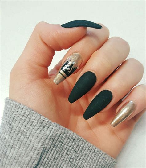 Matte Black Coffin Nails With Gold Chrome Accent Nails And Handdrawn