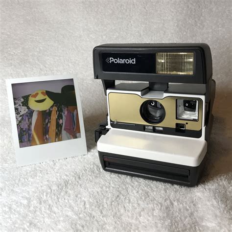 White With Brushed Gold Front Tested Polaroid 600 Onestep With Close Up