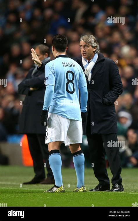 Manchester City Manager Roberto Mancini Gives Instructions To Samir