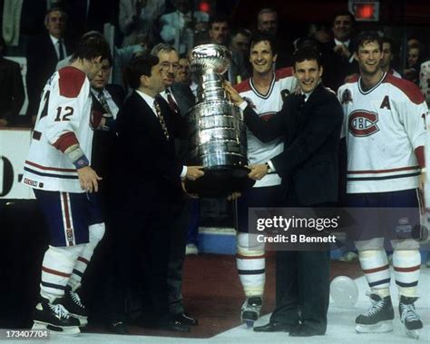 Commissioner Gary Bettman presents the Stanley Cup Trophy to Denis ...