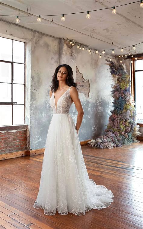 Ethereal Boho Lace A Line Wedding Dress With Plunging Neckline All