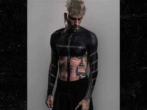 Machine Gun Kelly Debuts Upper Body Blackout Tattoo For Spiritual Purposes