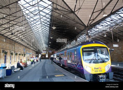 Train waiting at the platform of Scarborough railway station, North ...