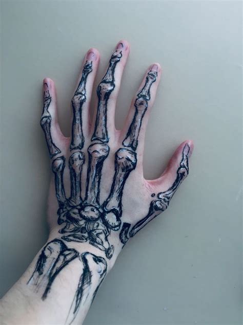 Cool Skeleton Hand Tattoo Ideas Meaning Artofit