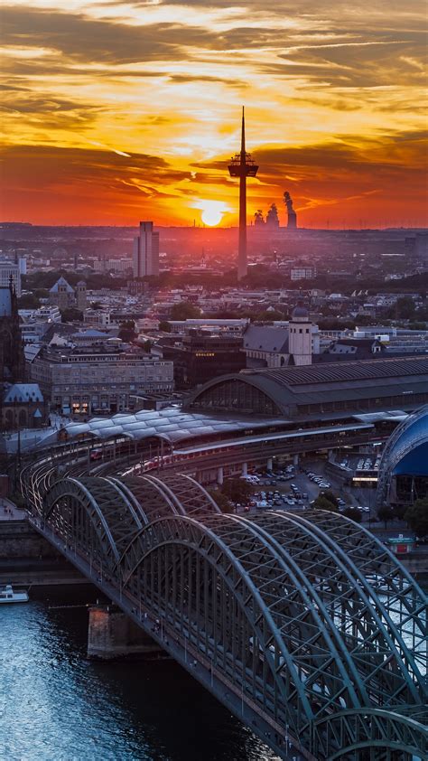 Sunset Over Historical Hohenzollern Bridge - backiee