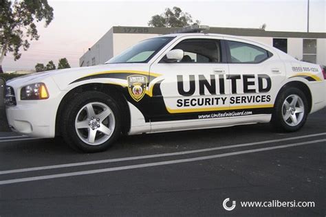 Security Patrol Cars With Some Reflective Vinyl For Night Time