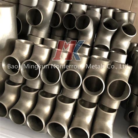 China Customized Titanium Asme B16 9 Reducing Outlet Crosses