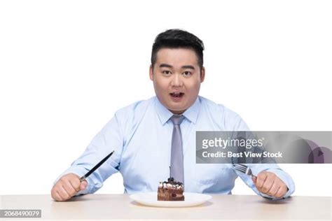 110 Fat Man Eating Cake Stock Photos High Res Pictures And Images