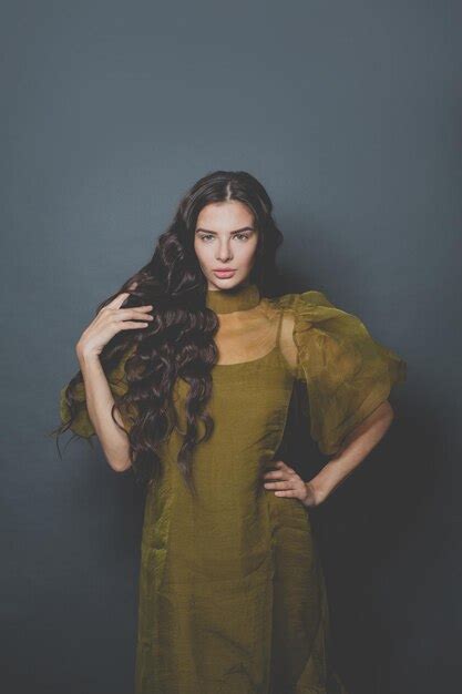 Premium Photo Perfect Brunette Woman With Long Curly Hair Wearing