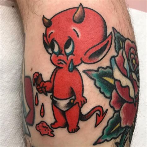 Sad Hot Stuff the little Devil tattoo on the calf.