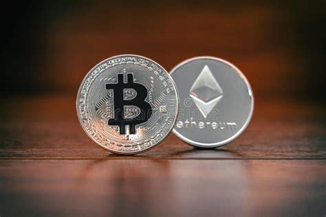 Top Cryptocurrency Pair Btc Eth Bitcoin And Ethereum On Brown Wood