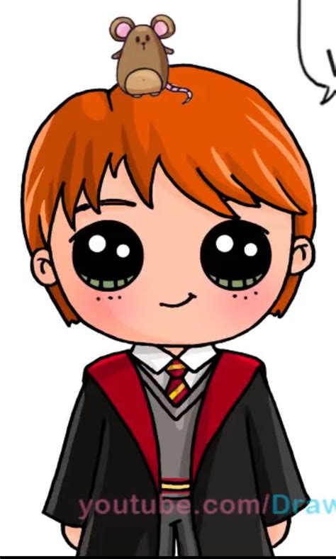 An Image Of A Boy With Red Hair Wearing A Harry Potter Robe And A Mouse