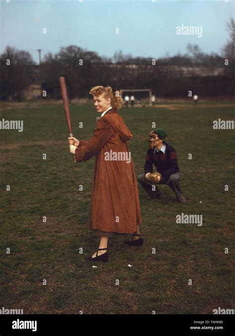 Vintage Photo Of A Girl Playing Baseball Stock Photo Alamy