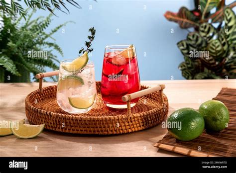 Sparkling Cocktails With Ice And Citrus On A Wicker Tray Popular