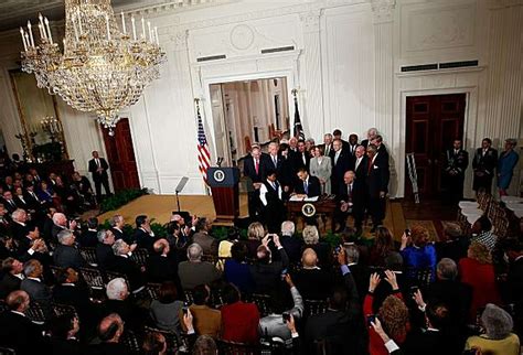 Obama Signs Health Care Reform Into Law